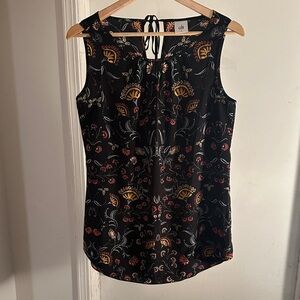 CAbi Black Sleeveless Blouse with Floral Accents